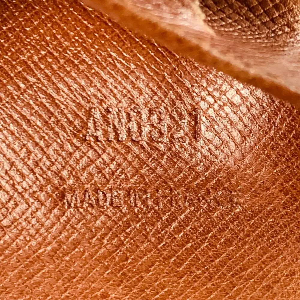 LOUIS VUITTON Brown Brass Monogram Coated Canvas Wallet